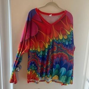 Long sleeve women’s top. Brightly colored, light, weight, and soft.